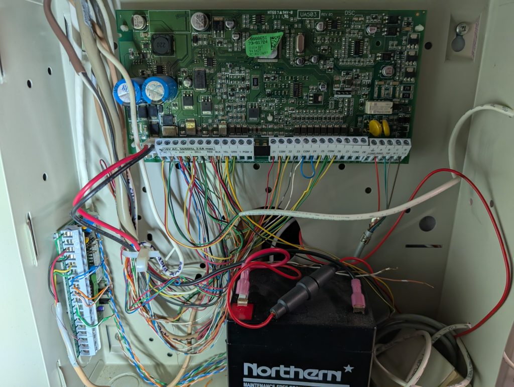 DSC alarm panel, System Take Over "S.T.O." before we swing it over to A.S.C. (a real messy install by Curtis Elite)